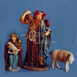 Pastor con leña y niño con cordero