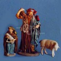 Pastor con leña y niño con cordero