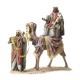Reyes a camello con pajes