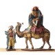 Reyes a camello con pajes