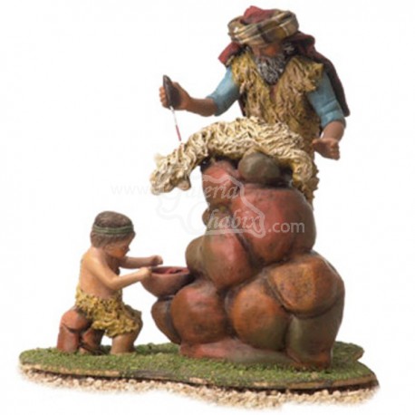 Pastor y niño sacrificando oveja