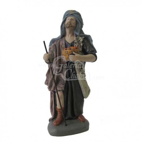 Pastor con cesta de frutas